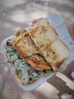 Masala Egg Omelette Sandwich . A cheap street food , prepared while you wait. Which was is good because you get to see how its done. (think fairly clean street food)